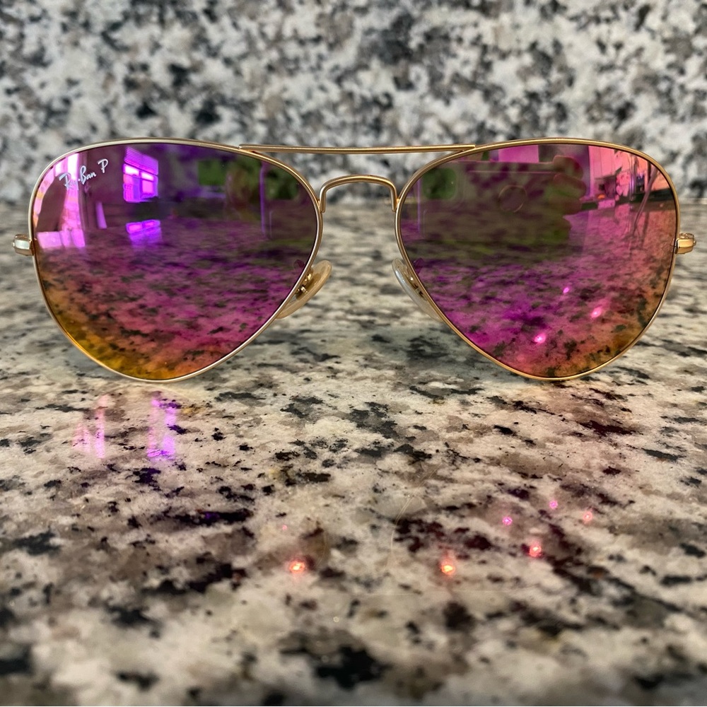 New! Ray Bans gold with pink/purple lenses.